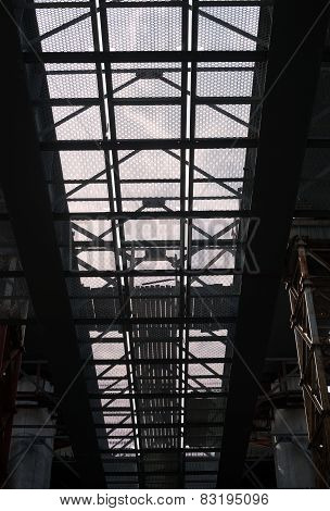 Bridge Construction. Metal Mesh Framework Of The Bridge