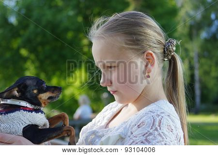 Portrait of a young girl with dog