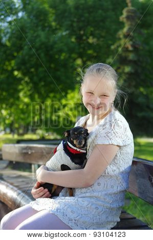 Portrait of a young girl with dog