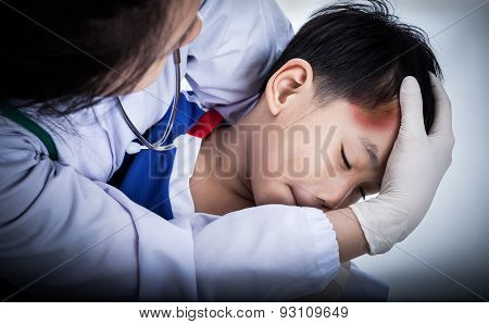 Sport Boy's Temple With A Bruise