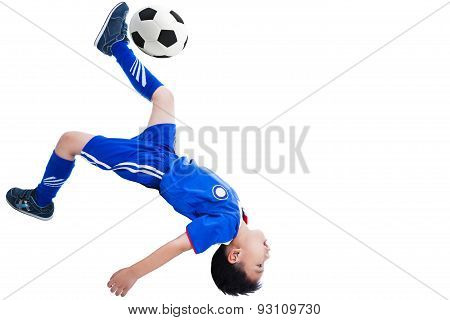 Youth Soccer Player Kicking The Ball