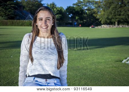 Beautiful Teen On A Bench