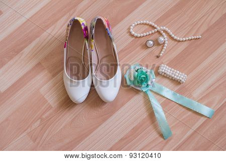wedding shoes bracelet and earrings, a necklace