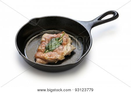 saltimbocca alla romana ( cooked veal, prosciutto and sage ) on skillet