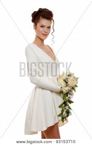 Young Happy Bride In White Short Dress With A Bouquet Of Flowers
