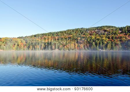 Sunrise Above Forest Lake