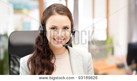 people, online service, communication and technology concept - smiling female helpline operator with headset over office background