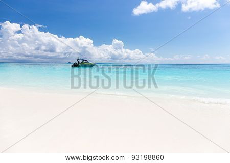 Beautiful Crystal Clear Sea And White Sand Beach With Boat At Tachai Island, Andaman, Thailand