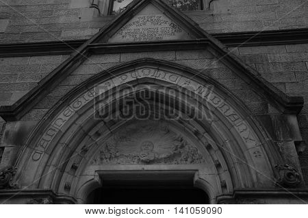 A view of the inscription carved into the elegant doorway of Dunfermline library