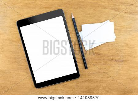 Digital Tablet Computer With Empty Screen,business Card And Black Pencil On Wooden Table, Mock Up Fo