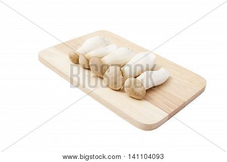 Eringi put on wood tray isolated on white background.