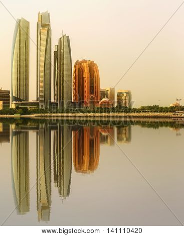 View of Abu Dhabi Skyline and Al Bateen marina at sunset, United Arab Emirates