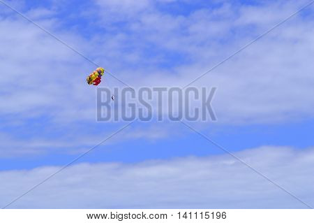 Parasailing above Playa De Las Americas beach in Tenerife