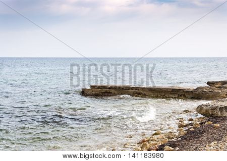Breakwater. Picture taken in Santa Pola town. It is a coastal town located in the comarca of Baix Vinalopo in the Valencian Community Alicante Spain by the Mediterranean Sea.
