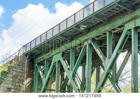 Former old riveted railway bridge of steel for pedestrians and cyclists on the Ruhr in Essen Kupferdreh.