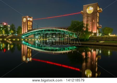 Beautiful Architecture Building And Colorful Bridge In Twilight Time.