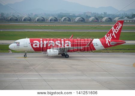 HANOI, VIETNAM - JANUARY 12, 2016: Airbus A320-216 (HS-BBH) airlines Thai AirAsia in the international airport of Noi Bai