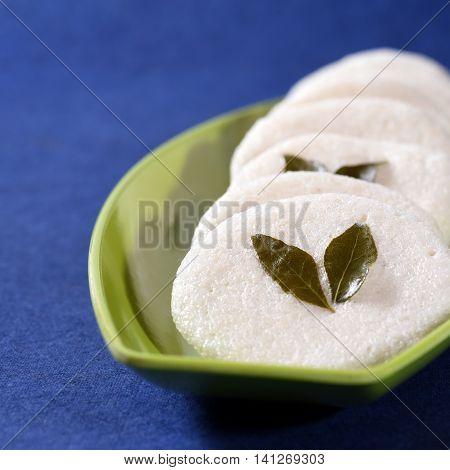 South indian cuisine vegetarian breakfast rava idli or idly in a plate.