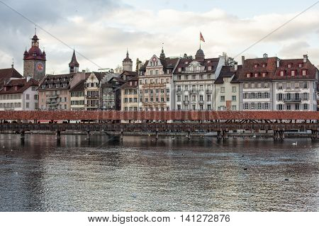Kapellbrucke chapel with water tower in Lucerne, Switzerland; eldest bridge in Europe; main landmark of Swiss Luzern town;