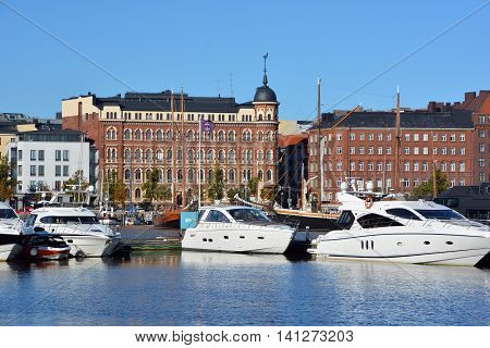 HELSINKI FINLAND 09 25 2015: Pohjoisranta is located in center and runs along northern harbor. On waterfront there are houses built in different architectural styles in different historical periods