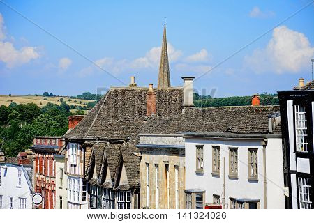 BURFORD, UNITED KINGDOM - JULY 20, 2016 - Interesting architecture detail above shops along The Hill shopping street Burford Oxfordshire England UK Western Europe, July 20, 2016.