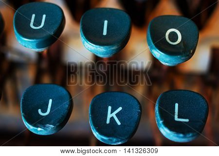 Typewriter Keys Close Up. Keyboard Detail of a Vintage Rusty Typewriter. Typewriter Buttons. Selective Focus and Shallow Depth of Field.