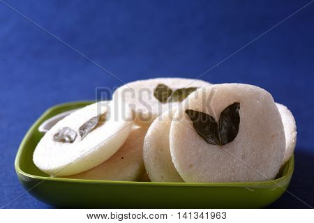 Idli With Coconut Chutney On Blue Background, Indian Dish : South Indian Favourite Food Rava Idli Or