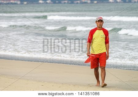 Beach Inspector Passing By At The China Beach Of Danang