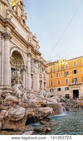 Trevi Fountain And Tourists In Rome In Italy