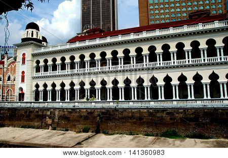 Kuala Lumpur Malaysia - January 4 2008: Double colonnades with neo-Moorish windows decorate the government's law courts building in Merdeka Square