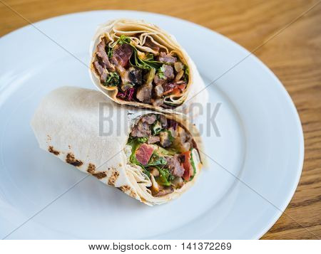 Rolls In Pita Bread With Roasted Meat, Tomatoes And Herbs