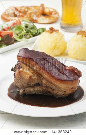 frankonian schaeufele roasted pork portion with beer