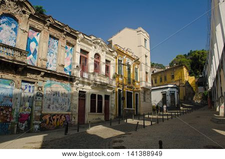 RIO DE JANEIRO, BRAZIL- AUGUST 21, 2012: Antique buildings in front of the Lapa Arch in the neighborhood of Lapa, Rio de Janeiro
