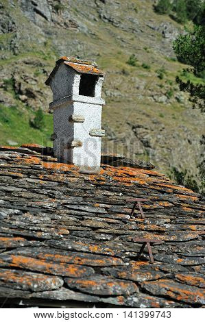 Alpine chimney and roof coatings stone in Rhemes Notre Dame