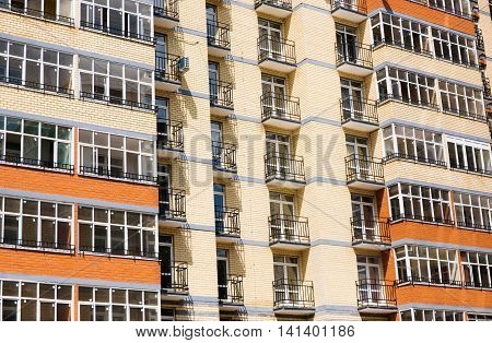 New modern multistorey apartment building with balconies