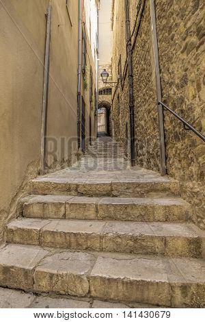 Ancient medieval narrow street in Girona. Spain. Catalonia.