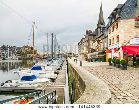HONFLEUR, FRANCE - MAY 7 2014: Old harbor Honfleur in early morning. Normandy, France