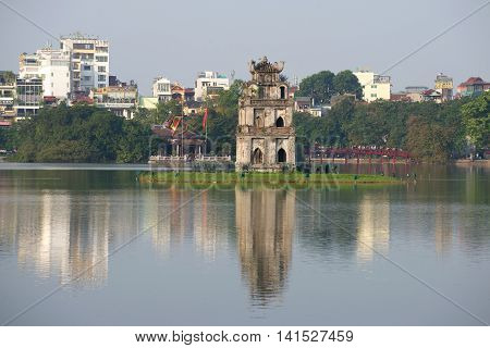 HANOI, VIETNAM - DECEMBER 13, 2015: View of the Turtle tower on the Lake of the returned sword. Religious landmark  of the city Hanoi, Vietnam