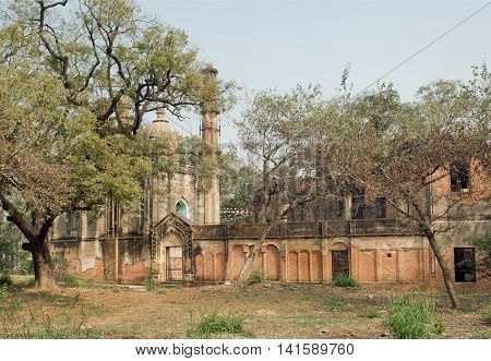 Park with structures of Lucknow Residency built in mughal style in India. Residency took place between 1780 to 1800 served as residence for British Resident General