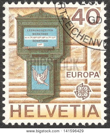 MOSCOW RUSSIA - CIRCA MAY 2016: a post stamp printed in SWITZERLAND shows a letterbox of Basel the series 
