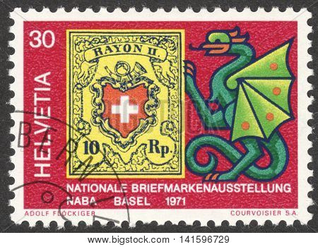 MOSCOW RUSSIA - CIRCA APRIL 2016: a post stamp printed in SWITZERLAND shows coat of arms dedicated to Stampexhibition NABA circa 1971