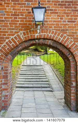 Old birck wall - entry to Cathedral in Frombork.