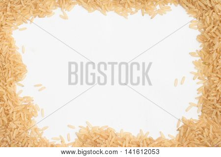 Raw Bown rice frame in white background