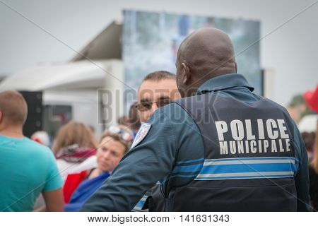 French Municipal Police Monitoring The Public