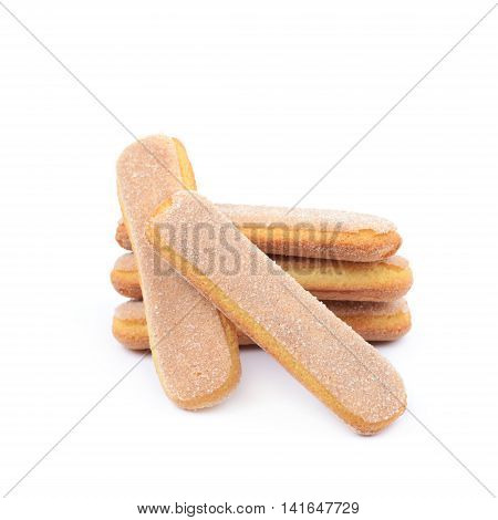 Pile of multiple ladyfinger savoiardi biscuit cookies, composition isolated over the white background