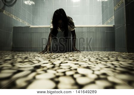 Scary person in white dress coming out from bathtub,Scary background for book cover
