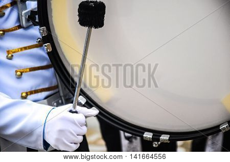 Marching band closeup on bass drum at school