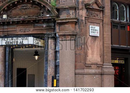 LONDON, UK - JULY 25: Vegetation grows from cracks in the historic facade of the Picturehouse Central cinema on Shaftesbury Avenue, London, part of a UK chain of art house film theatres on July 25, 2016.