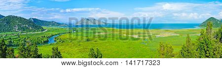 The wide area of the wet meadows on Skadar Lake the view from Virpazar hill Montenegro.
