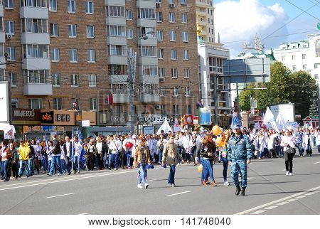 MOSCOW RUSSIA - SEPTEMBER 08: 11th students parade in Moscow on Bolshaya Yakimanka street. Taken on September 08 2012 in Moscow Russia.